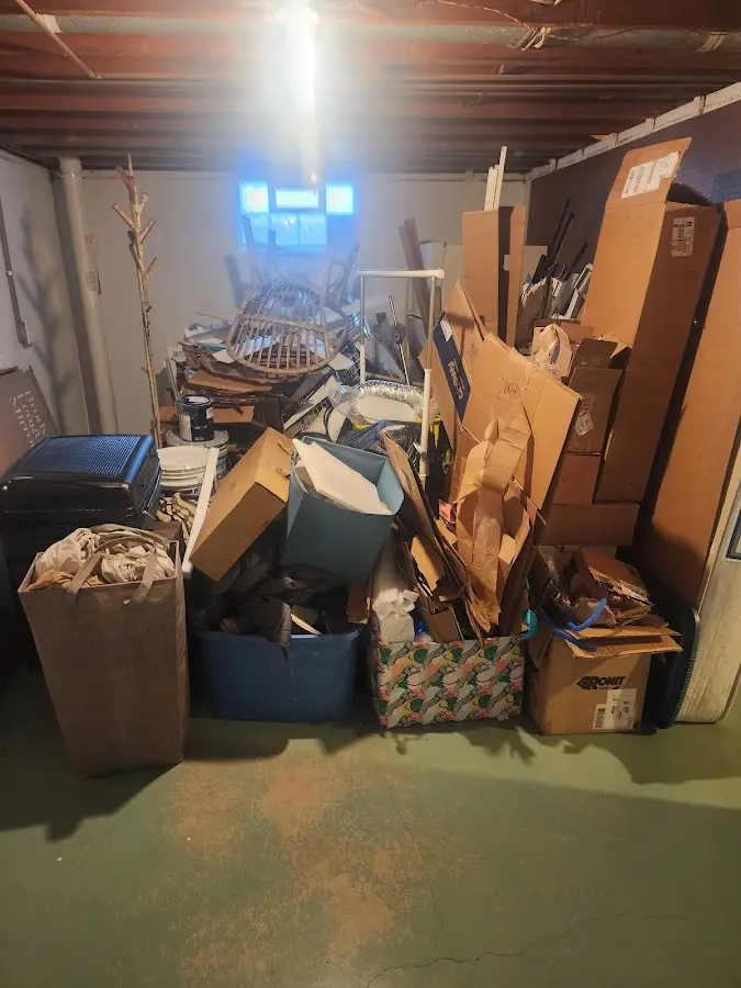 Roll-off dumpster container at job site for Construction Dumpster Rental in Pell City